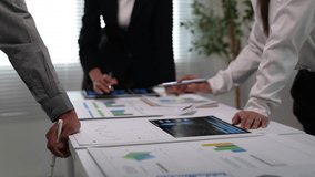 Business team analyzing financial data and reports in office meeting. - Powered by Shutterstock - Get 15% off with code: PIKWIZARD15