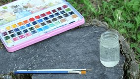 Woman Sets Down Handmade Blue I Love You Mom Card for Happy Mothers Day with Watercolors and Art Supplies Nearby 4K Video Stock Footage - Powered by Shutterstock - Get 15% off with code: PIKWIZARD15