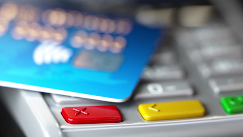 Credit card on POS terminal. Macro video animation with variable depth of field DOF effect.