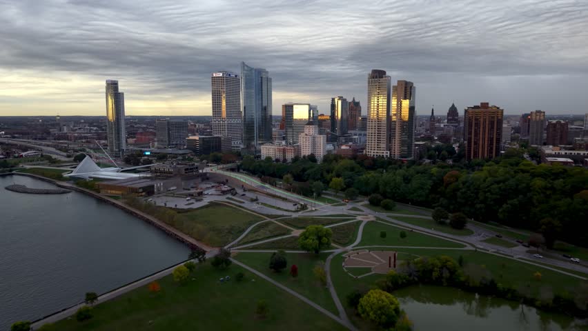 aerial pushing into the milwaukee wisconsin skyline at sunrise