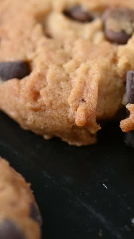 Baked chocolate chip cookies on a baked tray