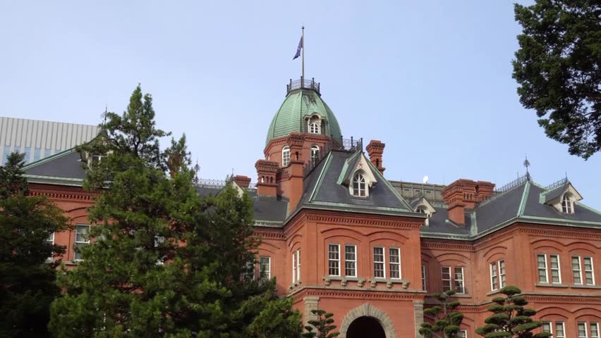 Historical red brick building with green dome in Sapporo Hokkaido Japan view