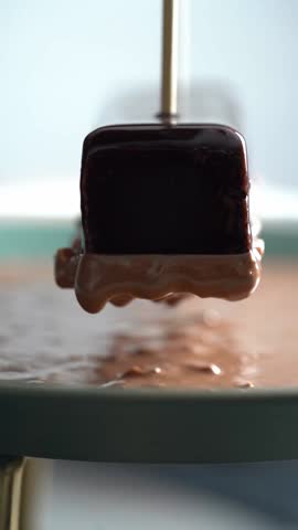 A chief prepare a gateau plate for dessert, close up shot, insert shot