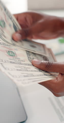Woman, hands and counting money with dollar bills for finance, cash or budget in office. Accounting, business person and employee with financial expenses, laptop and audit document or project funding