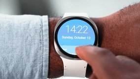 African American Man Trying To Unlock Smartwatch - Powered by Shutterstock - Get 15% off with code: PIKWIZARD15
