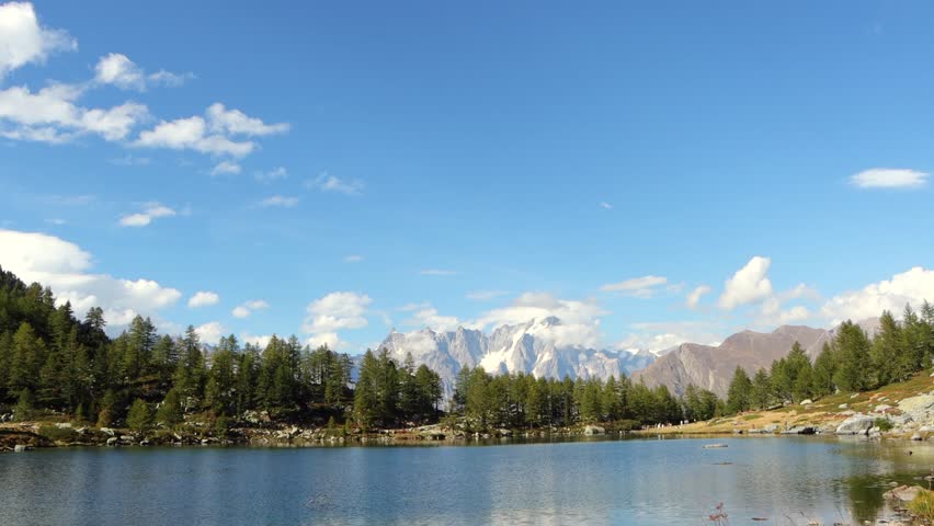 There are stories told in the cold of the mountains, in places where greatness confronts smallness and man feels infinite in the snow of the cold, snowy lake in Mont Blanc