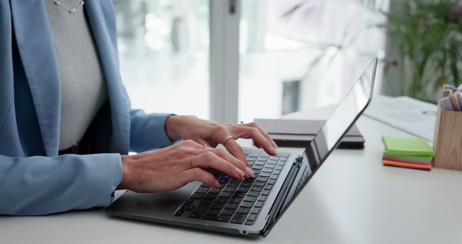 Hands, business and woman with laptop in office for research, finance report and budget review. Female person, typing and pc to email client, financial planning and information on investment proposal