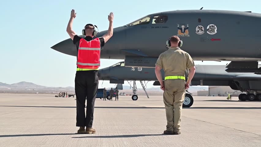 U.S. Air Force Airmen assigned to the 28th Bomb Wing prepare a B-1B Lancer for takeoff during the last day of Bamboo Eagle 24-3 at Nellis Air Force Base, Nev., Aug. 9, 2024. 