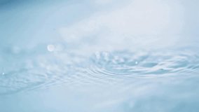 Water Drop Ripples on Blue Surface - Powered by Shutterstock - Get 15% off with code: PIKWIZARD15