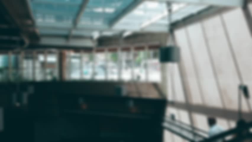 Blurred motion of people at the entrance of Oscar Freire subway station, São Paulo Yellow Line, urban city scene