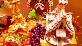 Brilliant Merry Christmas candy house with Santa Claus and gingerbread figures in a royal-themed decorative setting — festive holiday display full of color and sparkle. - Powered by Shutterstock - Get 15% off with code: PIKWIZARD15