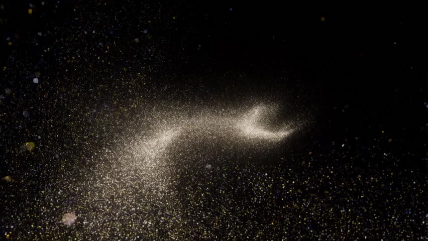 Ephemeral Dust Dance: An abstract display of fine particles swirling gracefully against a backdrop of deep black, capturing a fleeting moment of artistic expression and mysterious beauty.