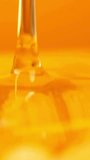 Thick golden honey is poured in a macro close up. The viscous, sweet liquid folds and ripples, creating a beautiful abstract yellow background. - Powered by Shutterstock - Get 15% off with code: PIKWIZARD15