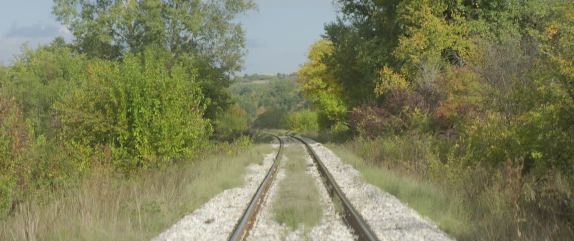 Old railroad lane by sunny day 5.7K anamorphic video