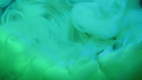 Ink vapor. Puff paint. Green blue turquoise swirl cloud flow in shimmering water. Mystic defocused veil art abstract neon stream background. - Powered by Shutterstock - Get 15% off with code: PIKWIZARD15