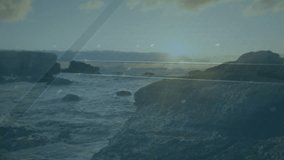 Sun nearing horizon causing overlay pulsing while waves lapping shoreline visualizing network data. Coastal, seascape, digitalart, connectivity, landscape, nature, technology - Powered by Shutterstock - Get 15% off with code: PIKWIZARD15