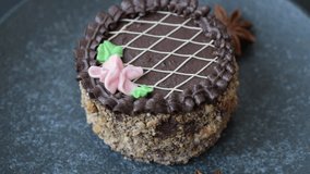 Sweet tart, pie with chocolate and cream with fruit filling on a plate. Chocolate tart dessert for a festive table - Powered by Shutterstock - Get 15% off with code: PIKWIZARD15