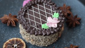 Sweet tart, pie with chocolate and cream with fruit filling on a plate. Chocolate tart dessert for a festive table - Powered by Shutterstock - Get 15% off with code: PIKWIZARD15