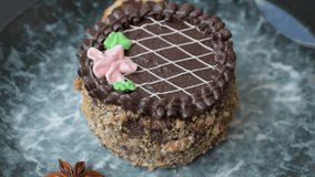 Sweet tart, pie with chocolate and cream with fruit filling on a plate. Chocolate tart dessert for a festive table - Powered by Shutterstock - Get 15% off with code: PIKWIZARD15