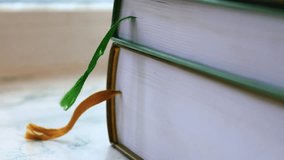 A close-up view of a book with a bookmark stuck in, suitable for illustration or reading-related concepts. - Powered by Shutterstock - Get 15% off with code: PIKWIZARD15