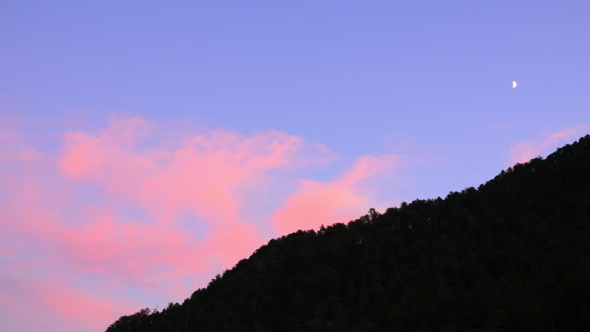  time lapse of clouds over the mountains