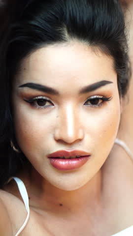 Vertical, Face of Beautiful Asian Model Posing For Camera, Close Up