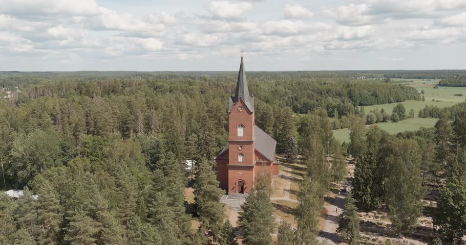 Aerial view of Mäntsälä church, which is a longitudinal church with a western tower in summer, Mäntsälä, Finland.