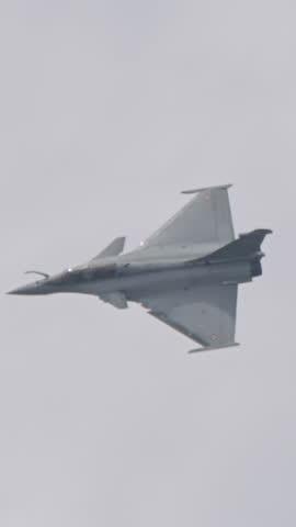 Fighter jet preforming high speed maneuvers showing its abilities