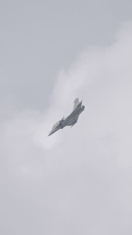 Fighter jet preforming high speed maneuvers showing its abilities