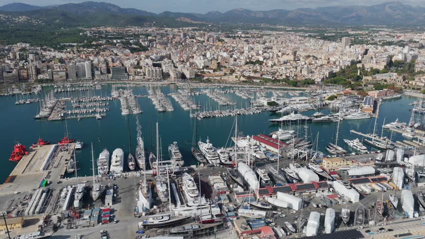 Aerial View of Palma de Mallorca Cityscape and Luxury Yacht Harbor with Cruises and Ferries