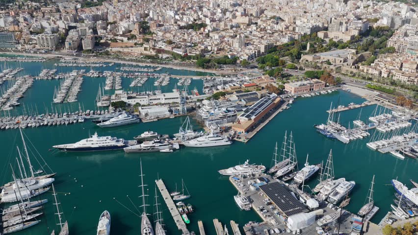 Aerial View of Palma de Mallorca Cityscape and Luxury Yacht Harbor with Cruises and Ferries