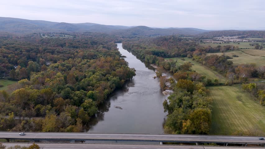 Drone Video along the Shenandoah River in the fall with the Appalachian Mountains in the background