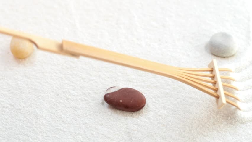 Making Zen garden in white sand