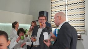 Young coworkers enjoying takeaway food with chopsticks during break in office. Casual, modern lifestyle moment, relaxed teamwork and social atmosphere. - Powered by Shutterstock - Get 15% off with code: PIKWIZARD15