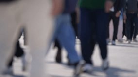 Close up of people walking on crowded street in slow motion. - Powered by Shutterstock - Get 15% off with code: PIKWIZARD15