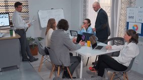 teams analyze collaboratively, teams work together analyzing data, teams collaborate actively to review data charts, teams coordinate closely to thoroughly analyze and review charts and data - Powered by Shutterstock - Get 15% off with code: PIKWIZARD15