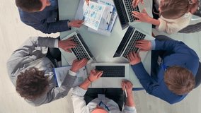 leadership analyzes performance metrics together, executive team engages in strategic planning with visual data, bright workspace hosts collaborative session analyzing charts and discussing growth - Powered by Shutterstock - Get 15% off with code: PIKWIZARD15