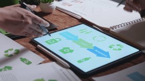 Collaborative Sustainability Planning Session Office Digital Presentation Modern Workspace Overhead View Eco-Friendly Initiatives - Powered by Shutterstock - Get 15% off with code: PIKWIZARD15