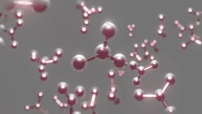This high-resolution looping animation features a dynamic cluster of glowing pink molecular structures drifting and rotating against a soft gray background, simulating a microscopic scientific environ - Powered by Shutterstock - Get 15% off with code: PIKWIZARD15