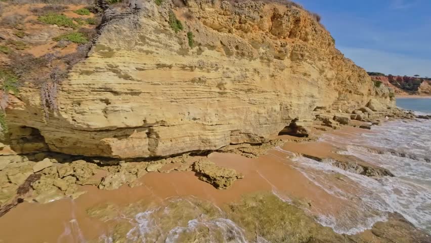 Algarve, Portugal, Praia dos Olheiros, Albufeira, southern Portugal, drone, aerial, coastline, beach, ocean, sea, waves, cliffs, rocks, shoreline, landscape, nature, travel, tourism, vacation, Europe,