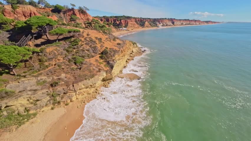 Algarve, Portugal, Praia dos Olheiros, Albufeira, southern Portugal, drone, aerial, coastline, beach, ocean, sea, waves, cliffs, rocks, shoreline, landscape, nature, travel, tourism, vacation, Europe,
