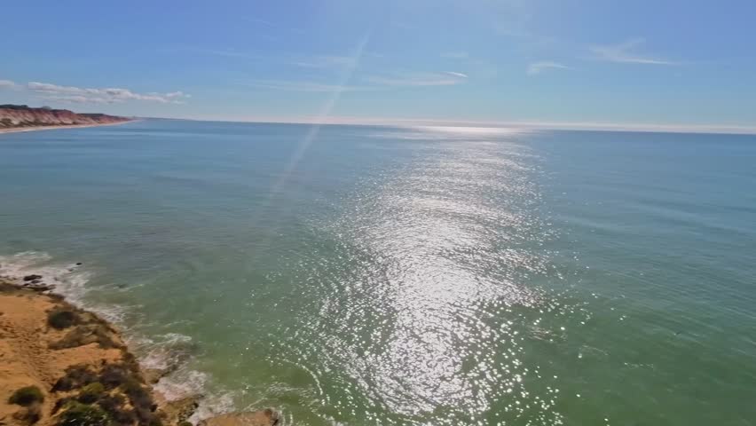 Algarve, Portugal, Praia dos Olheiros, Albufeira, southern Portugal, drone, aerial, coastline, beach, ocean, sea, waves, cliffs, rocks, shoreline, landscape, nature, travel, tourism, vacation, Europe,