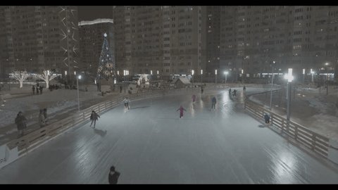 Drone Flying above Winter Ice Rink Christmas