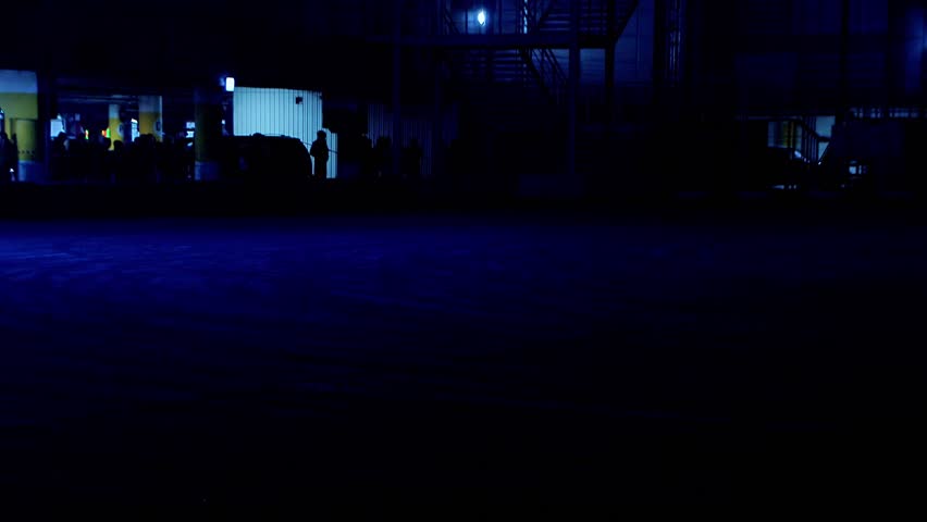 A night demonstration race of two drift cars on a special highway. Night lights of a big city. Russia. Moscow. 01.11.2025