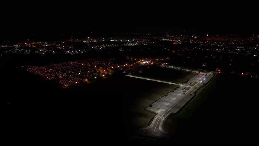 Aerial view of a Polish cemetery on All Saints’ Night, glowing with thousands of candles that honor the dead and illuminate the darkness with warmth and faith.