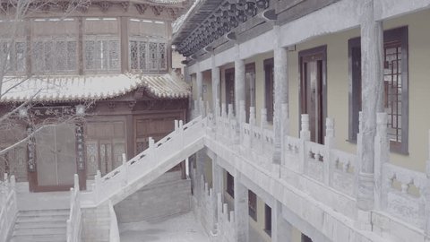 Drone Flying over Chinese Courtyard Stone Staircase