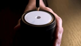 Female hand sticking pencil into automatic electric pencil sharpener and sharpening it close-up side view. Office stationery tool. Preparation for drawing and sketching. High quality 4k footage. - Powered by Shutterstock - Get 15% off with code: PIKWIZARD15