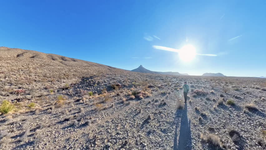 Man Hikes Across Flat Mesa De Anguila in Big Bend National Park
