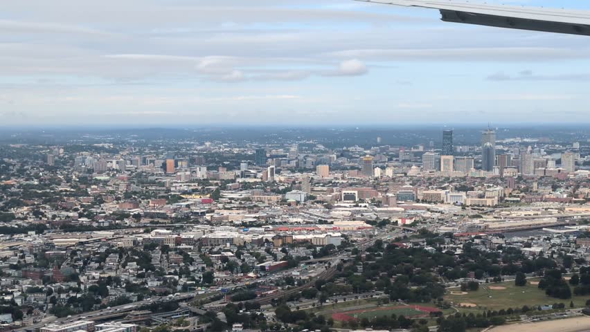 Diverse urban landscape of modern Boston, Massachusetts, USA. Skyscrapers of downtown at backdrop. Aerial view.
