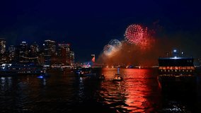 Beautiful fireworks at night over the East River. New York celebrates the 4th of July. View from the boat. - Powered by Shutterstock - Get 15% off with code: PIKWIZARD15